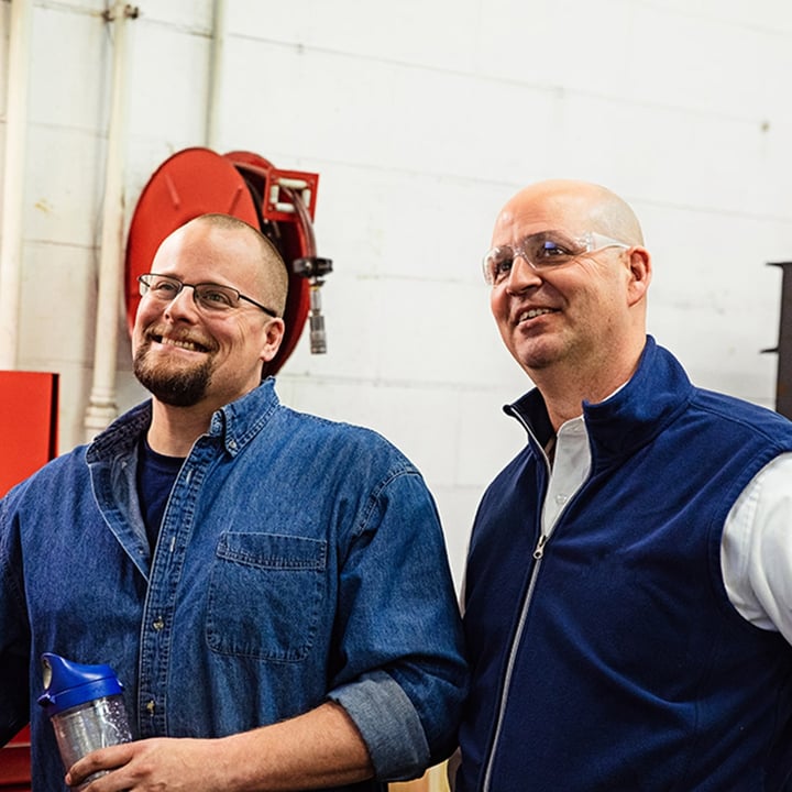 shop employees smiling