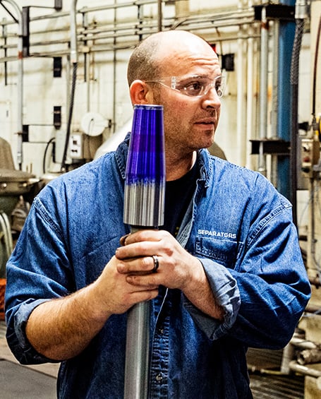 Separators employee working on rental bowl
