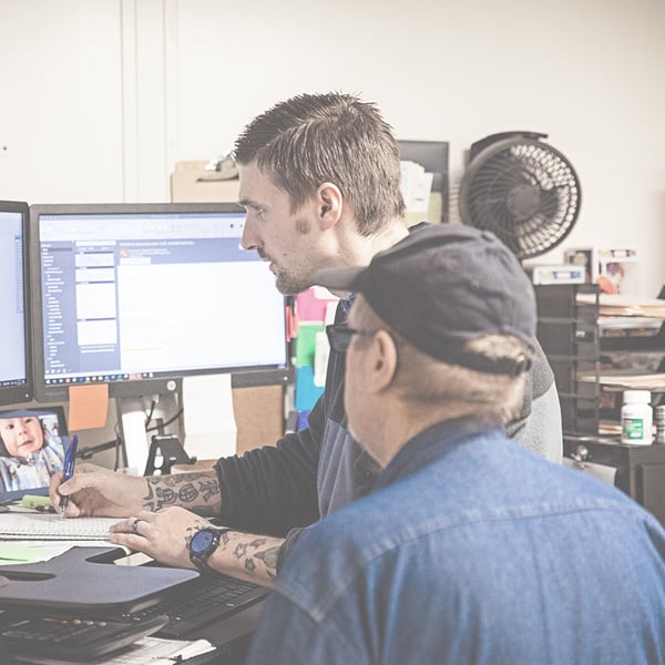 Separators employees working on computer