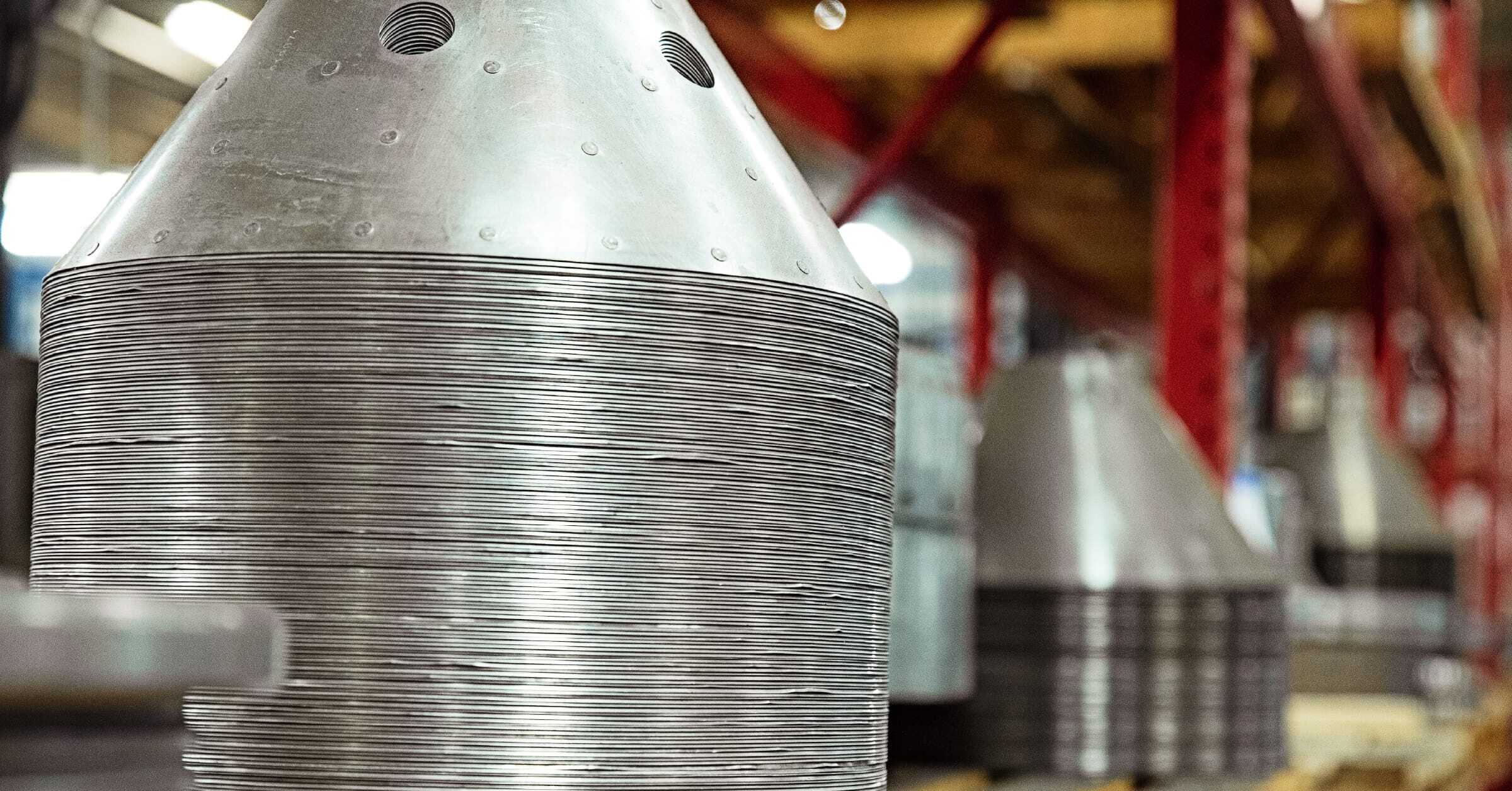 stacked-centrifuge-parts-on-shelf